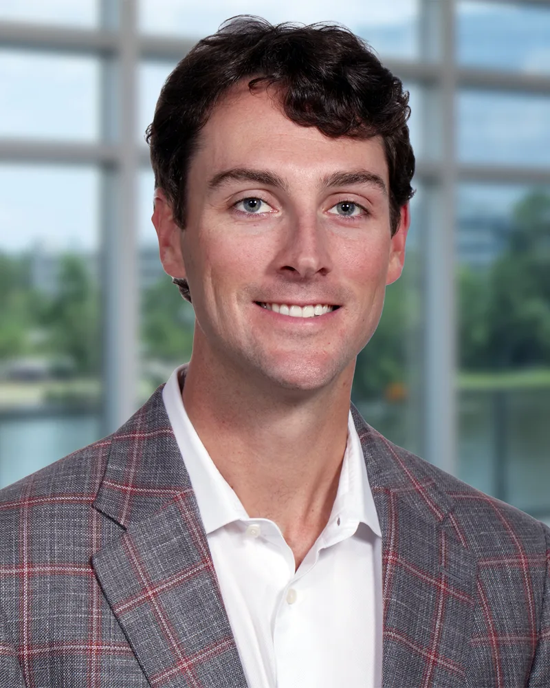 Professional executive portrait man in gray plaid blazer white polo shirt